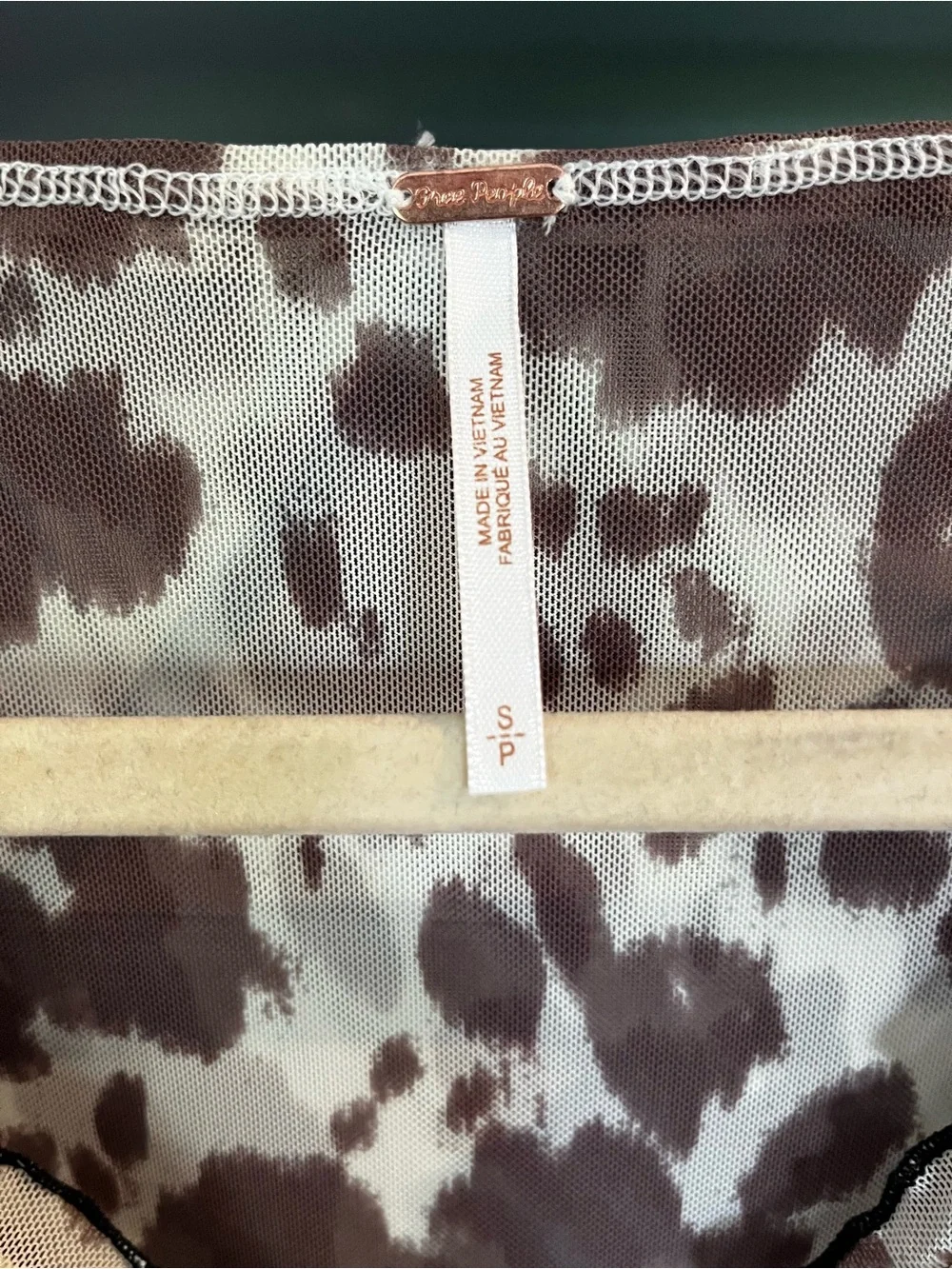 Free People Ruched Long-Sleeve Cow Print Top in Brown and Cream